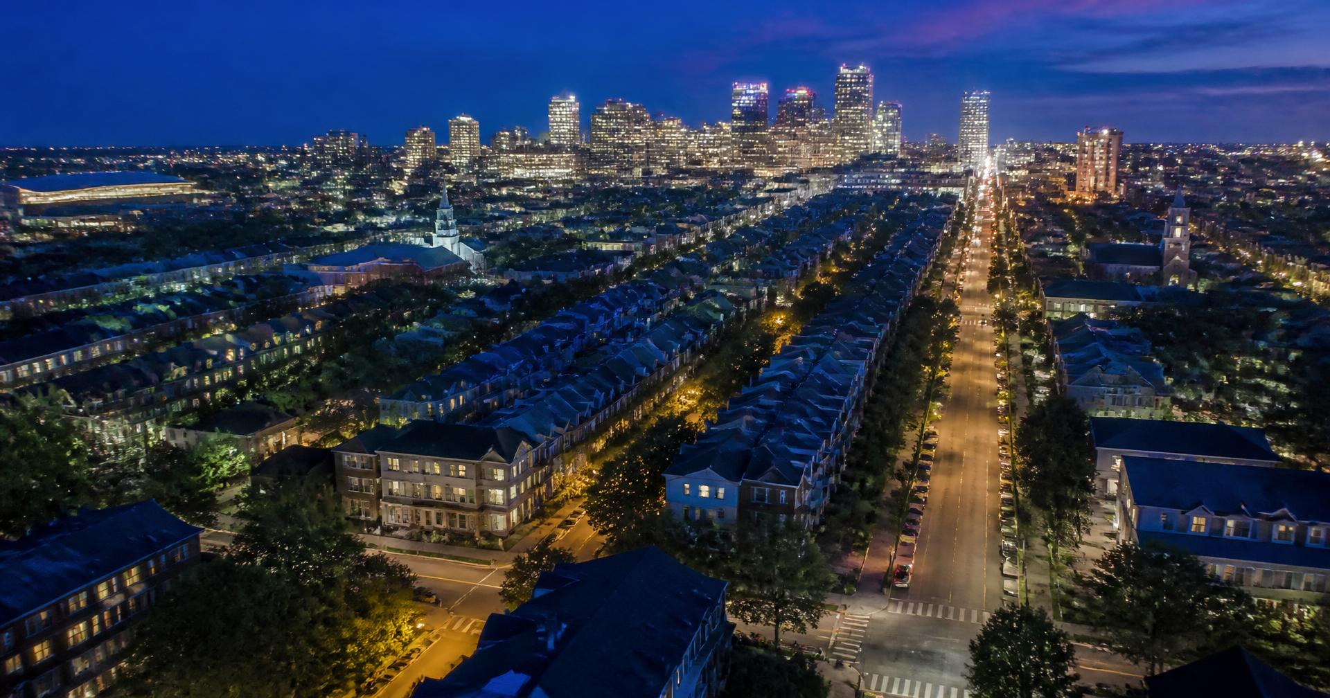 Aerial view of a revitalized urban neighborhood at twilight